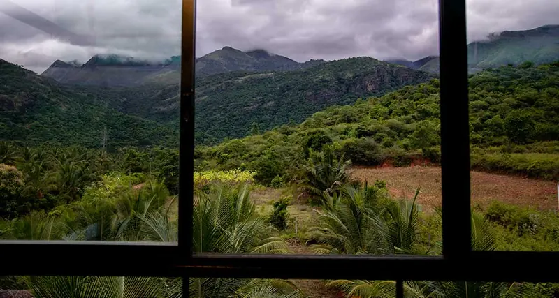 Hills of the Cumbum Valley framed by the farmhouse window